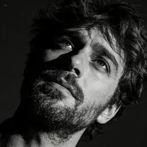 Dramatic Black and White Portrait with Silhouette Lighting Prompt