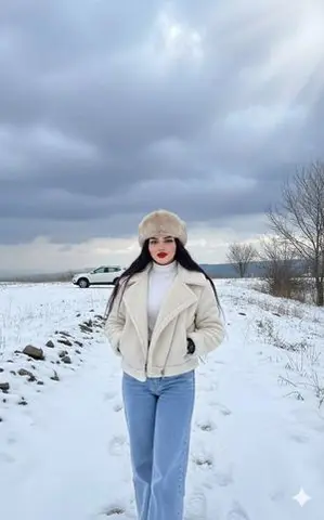 Winter Fashion Editorial in Snowy Field