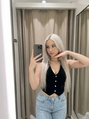 Gen Z Fashion Mirror Selfie in a Fitting Room