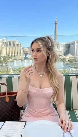 Sydney Sweeney Over-the-Shoulder Smile in Las Vegas