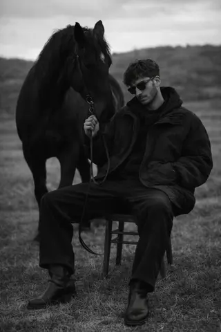 Young Man Ultra Detailed, Cinematic Black and White Portrait with Editorial Depth