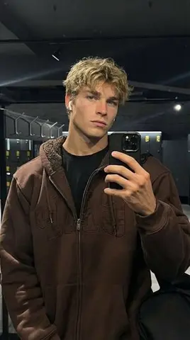 Photorealistic Mirror Selfie in a Modern Gym Locker Room