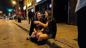 Candid Party Snapshot on Sidewalk