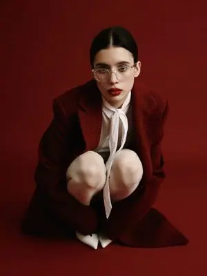 High-Fashion Editorial Portrait with Red Background