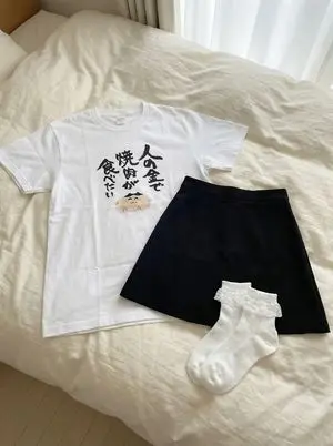 Clothing separated on the bed