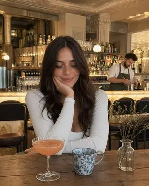 Woman at Elegant Bar Cafe Table