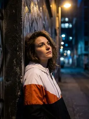 Dramatic Urban Portrait with Overhead Lighting