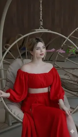 Crimson Red Fashion Editorial in Rattan Chair