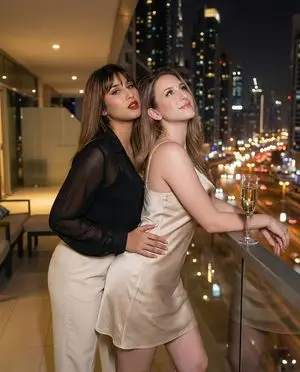 Two Women on Luxury Balcony at Night (Image-to-Image Prompt)