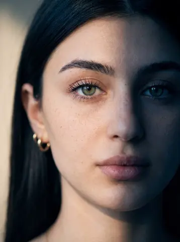Ultra-realistic close-up portrait of a young woman with fair