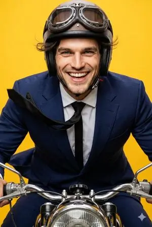 Dynamic Motorcycle Rider Portrait on Yellow Background