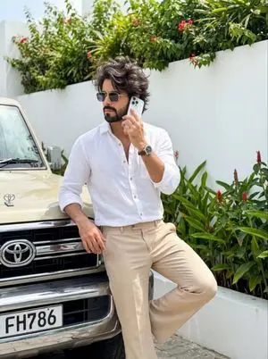 Ultrarealistic Image of Stylish Boy Leaning on Land Cruiser