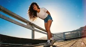 90s Analogue Photo of a Woman on a Sunlit Pier