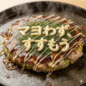 Close-up 1:1 image of hot okonomiyaki