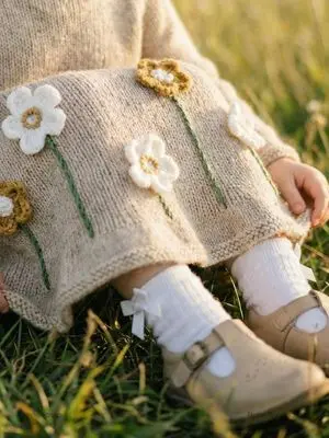 Lifestyle Photo of Toddler Running in Sunlit Meadow