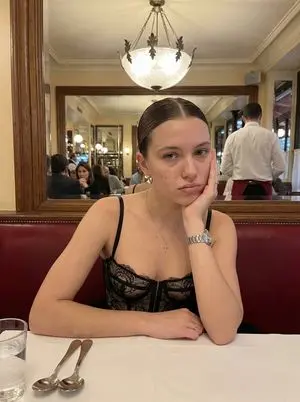 Warm-Lit Bistro Portrait of a Young Woman