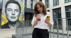Urban Lifestyle Portrait with Elon Musk Mural Background