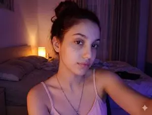 Intimate Low-Light Bedroom Selfie (Chiaroscuro)