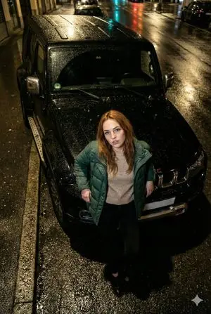 High-Angle Flash Photo on SUV Hood at Night