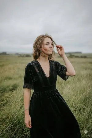 Serene Western Girl in Tall Grass Portrait