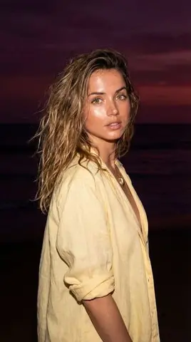 Late-Night Coastal Portrait with Flash and Sunset Glow