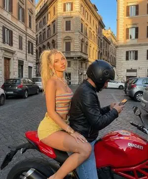 Photorealistic Street Photography of a Woman on a Motorcycle in Europe