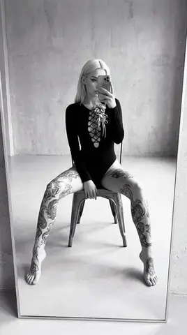 High-Contrast Black and White Tattooed Mirror Selfie