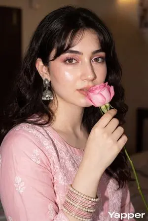 Glamorous Close-up Portrait with Traditional Outfit and Rose