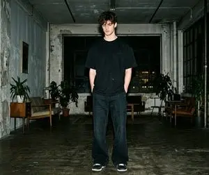 Hyper-realistic Nighttime Fashion Photograph with On-Camera Flash