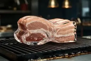 Hyperrealistic glass pork belly on a grill