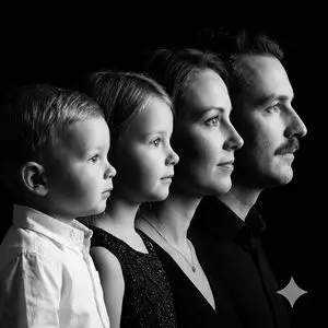 High-Contrast Black and White Family Studio Portrait