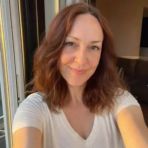 Realistic Golden-Hour Indoor Selfie