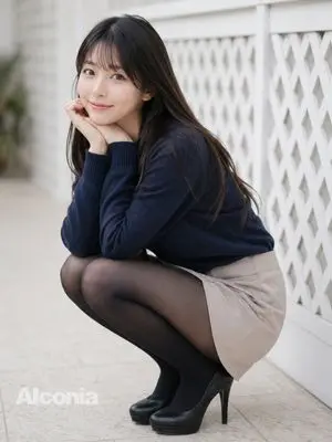Crouching Outdoor Fashion Portrait