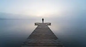 Minimalistic contemplative pier scene prompt for Nano Banana Pro