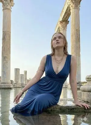 Modern Aphrodite in flooded ancient ruins