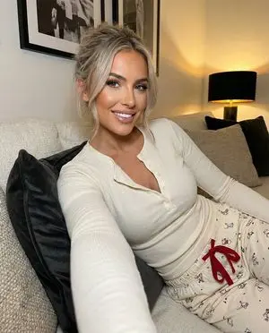 Photorealistic Selfie of a Woman in Pajamas
