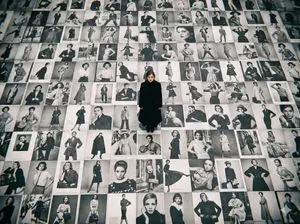 Bird's-Eye View of Actress on Billboard-Covered Ground
