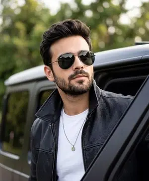 Cinematic Portrait of Man in Leather Jacket and Sunglasses