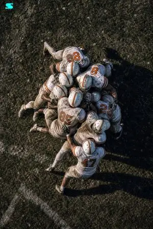Aerial American Football Huddle