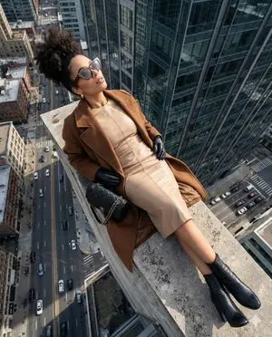 High-Angle Fashion Editorial on Skyscraper Rooftop Ledge