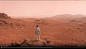 Astronaut on a Red Desert World